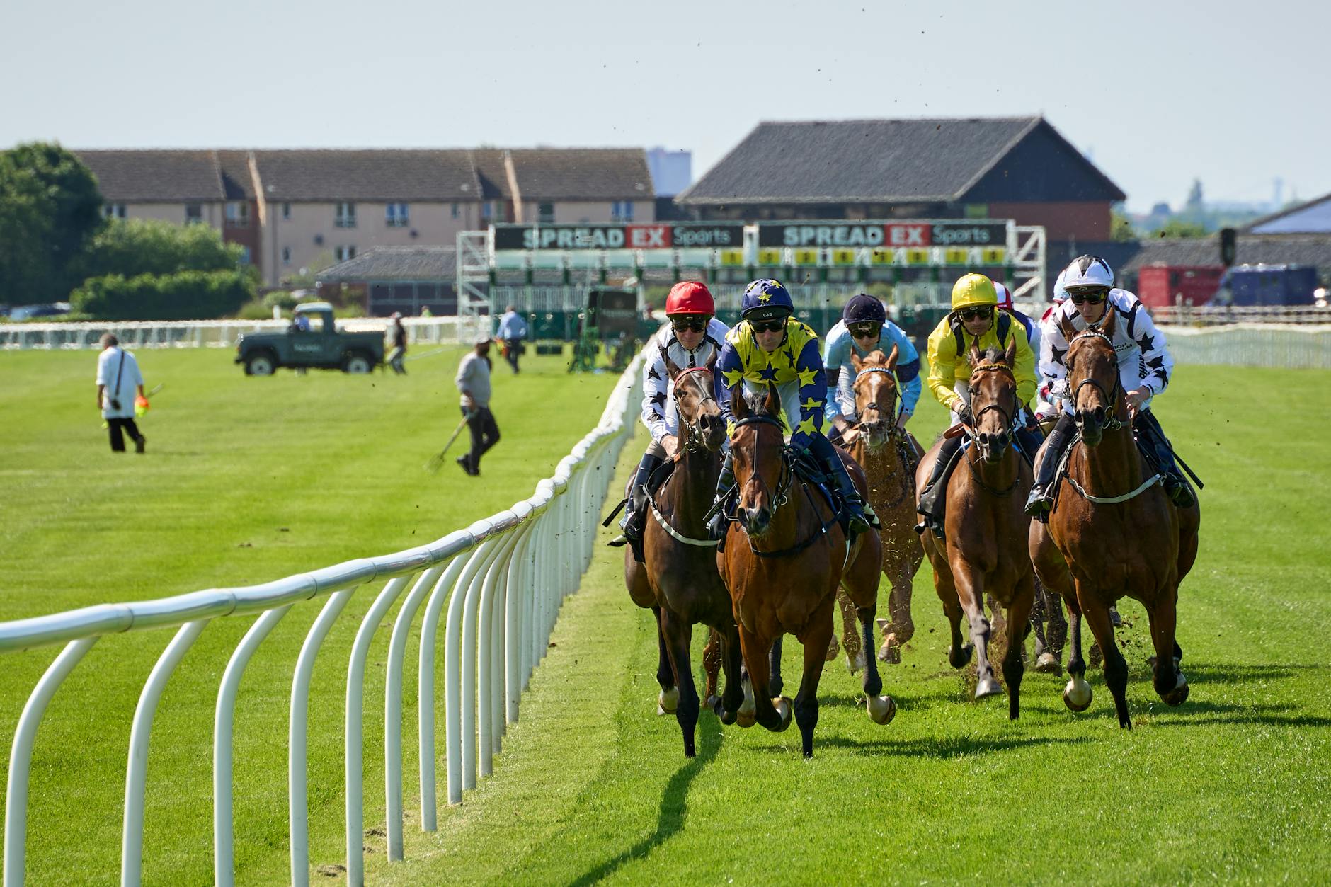 exciting horse racing event with jockeys in action